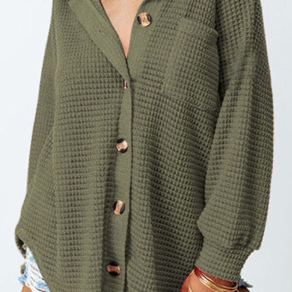 Stay casual but cute in this textured knit blouse Crafted from lightweight material with waffle knit texturingButton up front