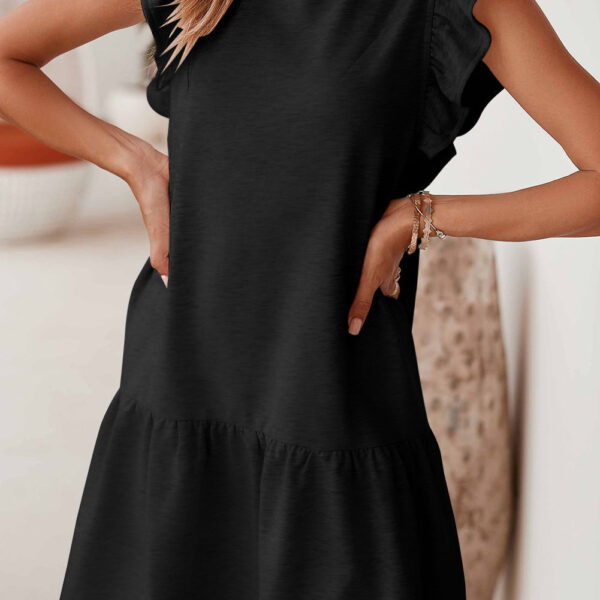 This fun summer dress is both chic and casual in style. It flatters most body shapes and features a crew neck