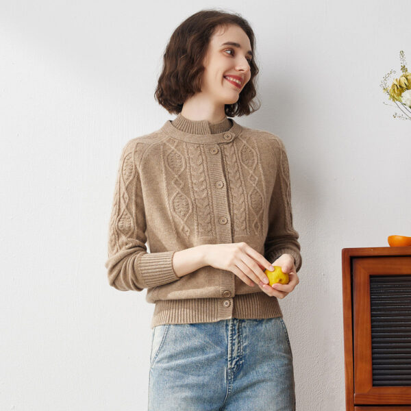 Wrap yourself in the luxurious warmth of this elegant cable knit cardigan. Crafted from premium cashmere