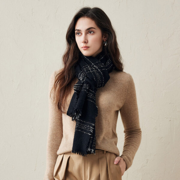 Wrap yourself in warmth and style with our Elegant Soft Fringed Cashmere Scarf. This cozy scarf