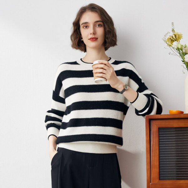Step up your fashion game with our Classic Black and White Striped Sweater
