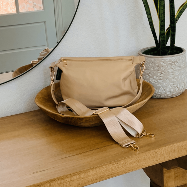 This adorable yet very functional nylon compact crossbody is the perfect  bag for your quick zips around town in style.This stunning bag features a space saving design perfect for your phone