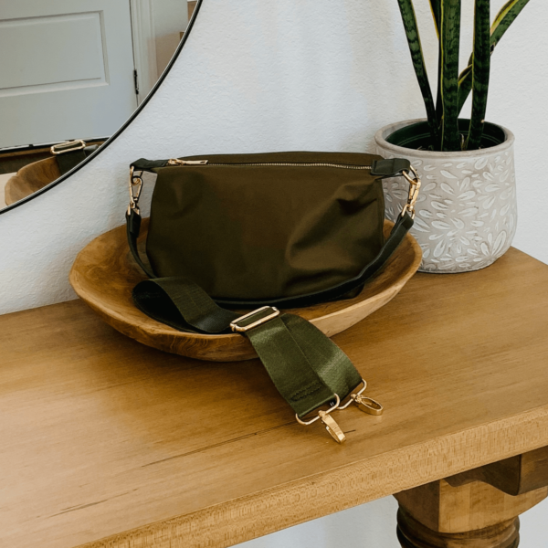 This adorable yet very functional nylon compact crossbody is the perfect  bag for your quick zips around town in style.This stunning bag features a space saving design perfect for your phone