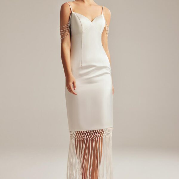 The AW Adeline wedding dress screams u201cElegance in Simplicity.u201d This floor-length bridal gown made with Tulle fabric is the go-to for the bride that shies away from the spotlight but appreciates a compliment. With sleeveless spaghetti straps that a