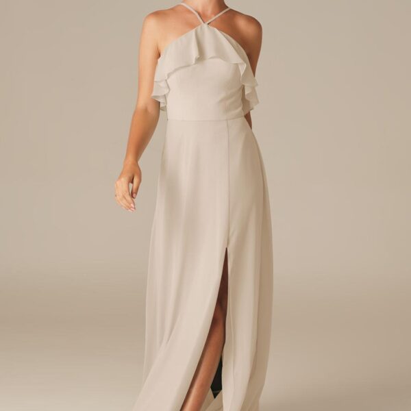 The daring thigh length slit in the Afra bridesmaid gown is quite flirty.The pleats and pretty layered look bodice add graceful movement that you'll fall in love with.Show off your toned legs with a pair of heels that will be perfect for dancing a