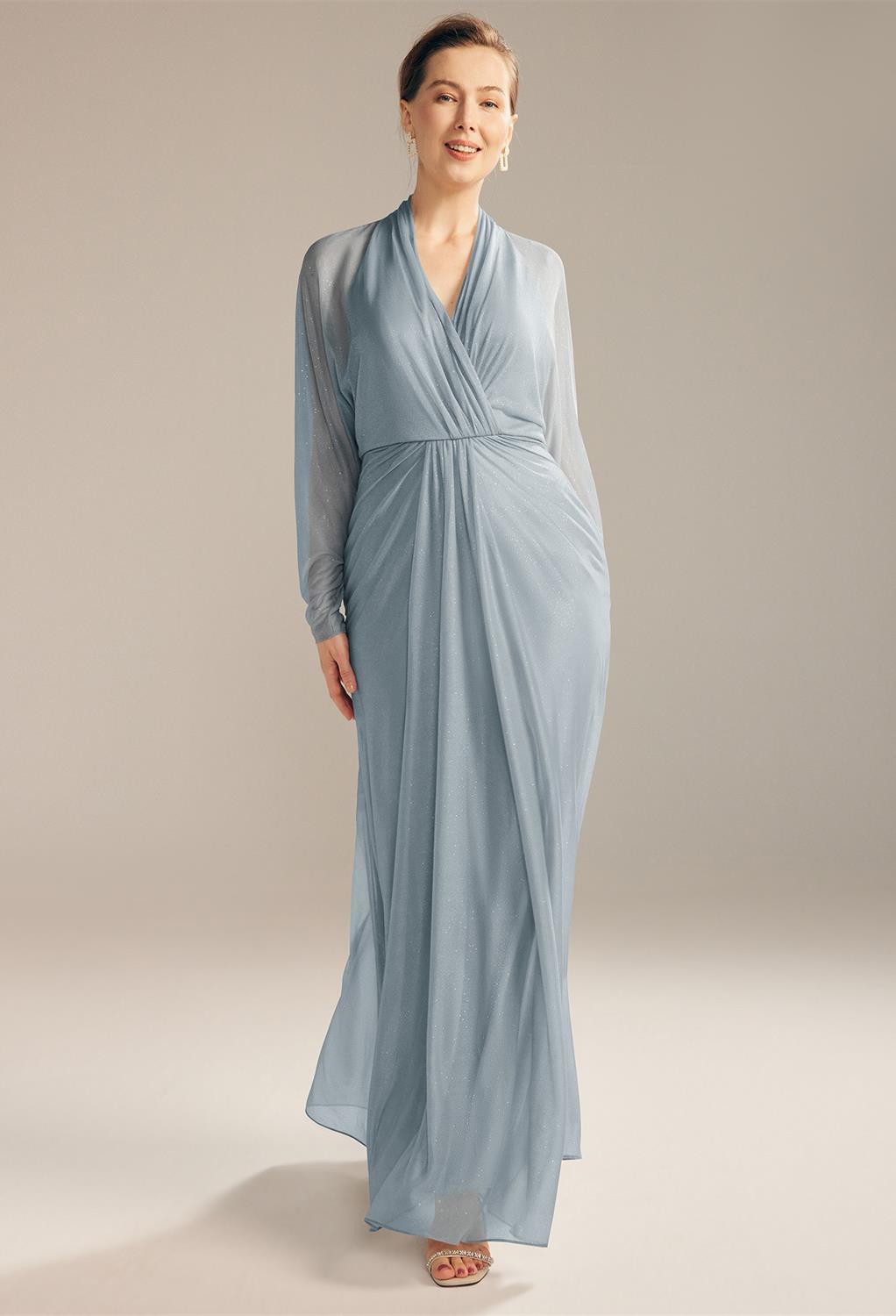 it's a floor-length dress with a mermaid silhouette. The unique minimalist fit-and-flare dress has a V-neckline and transparent open back design