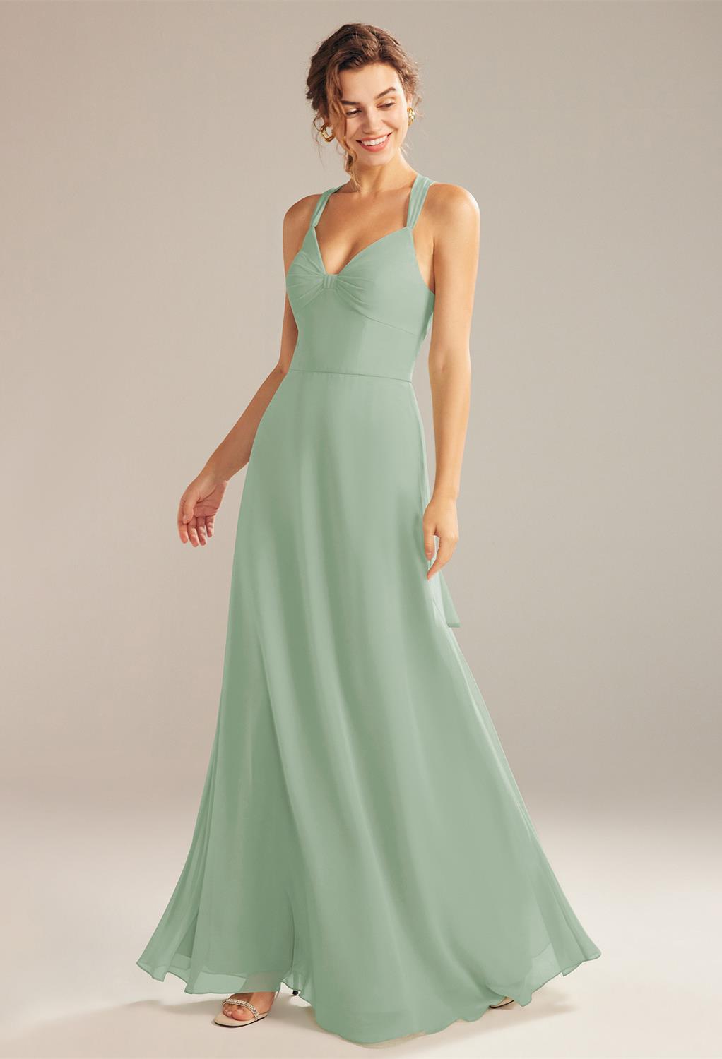 this is a floor-length A-line dress with V-neckline that gives avene for jewelry. It also features charming details like an open back laced up wi