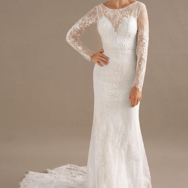 the Antonia wedding gown offers a combination sweetheart and bateau neckline. The long applique embellished sleeves are simply pretty touch. The neckline flatters and frames the brideu2019s beautiful face