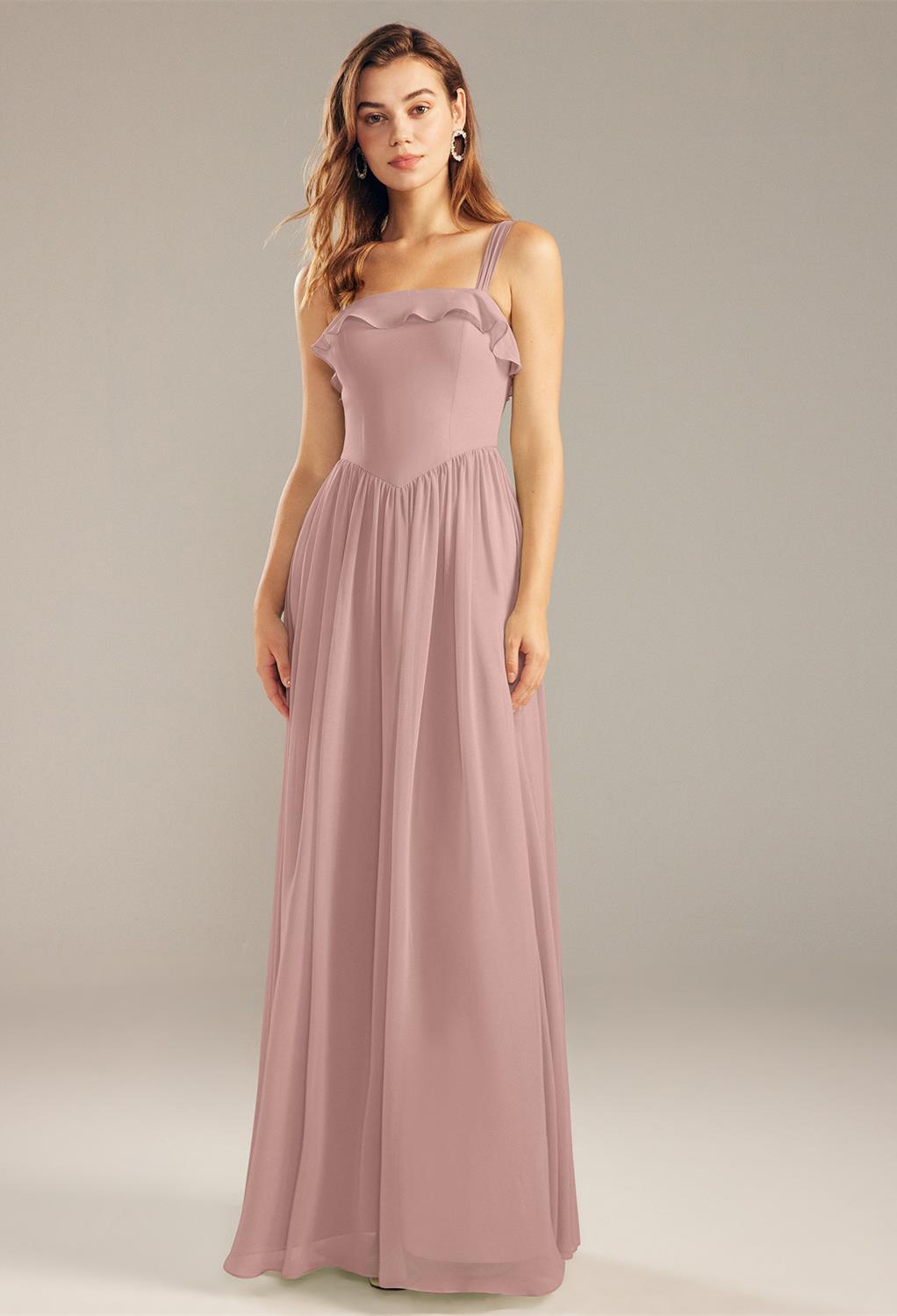built-in bra and side zipper. Her unique square neckline with flair cape-like gathering lined acr