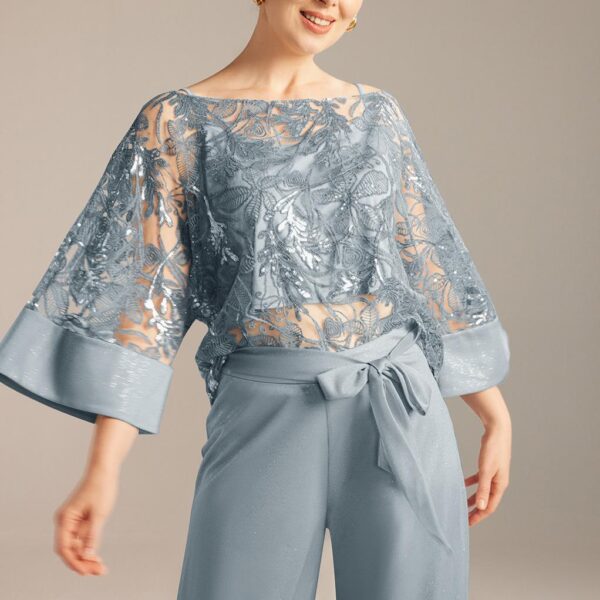 super-stylish outfit for a casual or corporate wedding. This 3-piece is designed with glitter mesh fabric and features a floor-length pant trousers decorated with a front bow