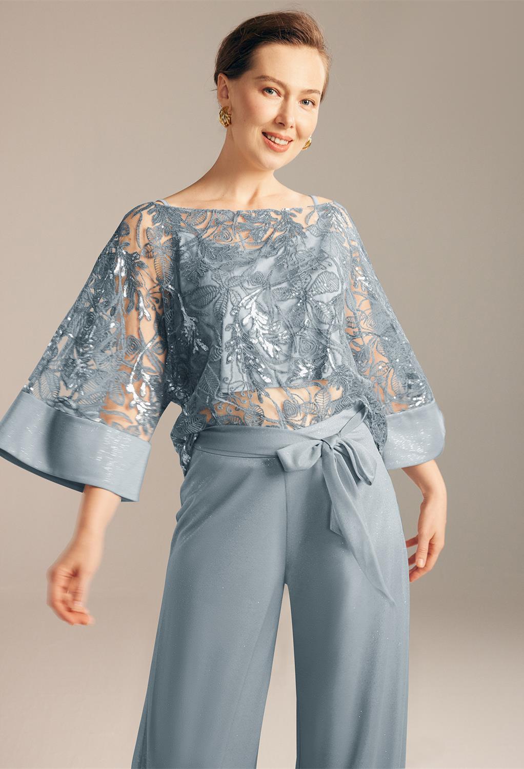 super-stylish outfit for a casual or corporate wedding. This 3-piece is designed with glitter mesh fabric and features a floor-length pant trousers decorated with a front bow