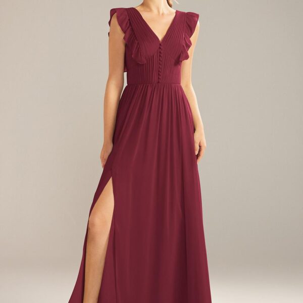 Chaba is a floor-length A-line dress with a v-neck line and built-in bra. Her ruffled design adorn the arms of the wearer. It features a thigh-high slit that highlight