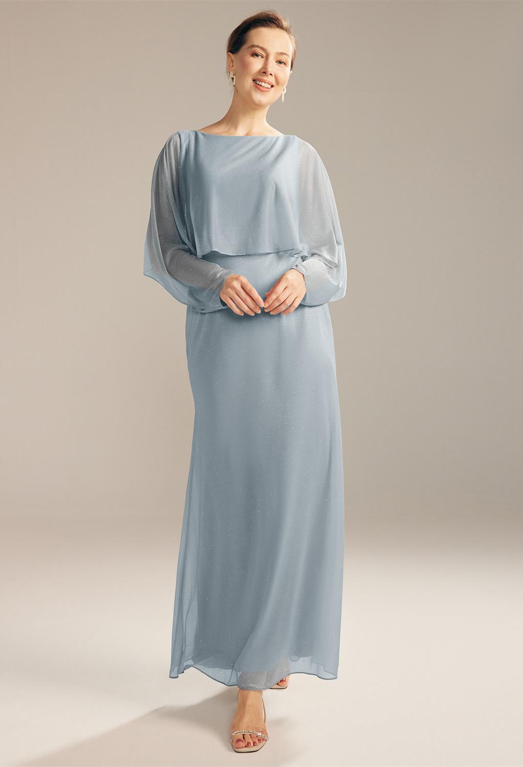 AW Clarissa's side zipper makes it easy-to-wear and its transparent lon