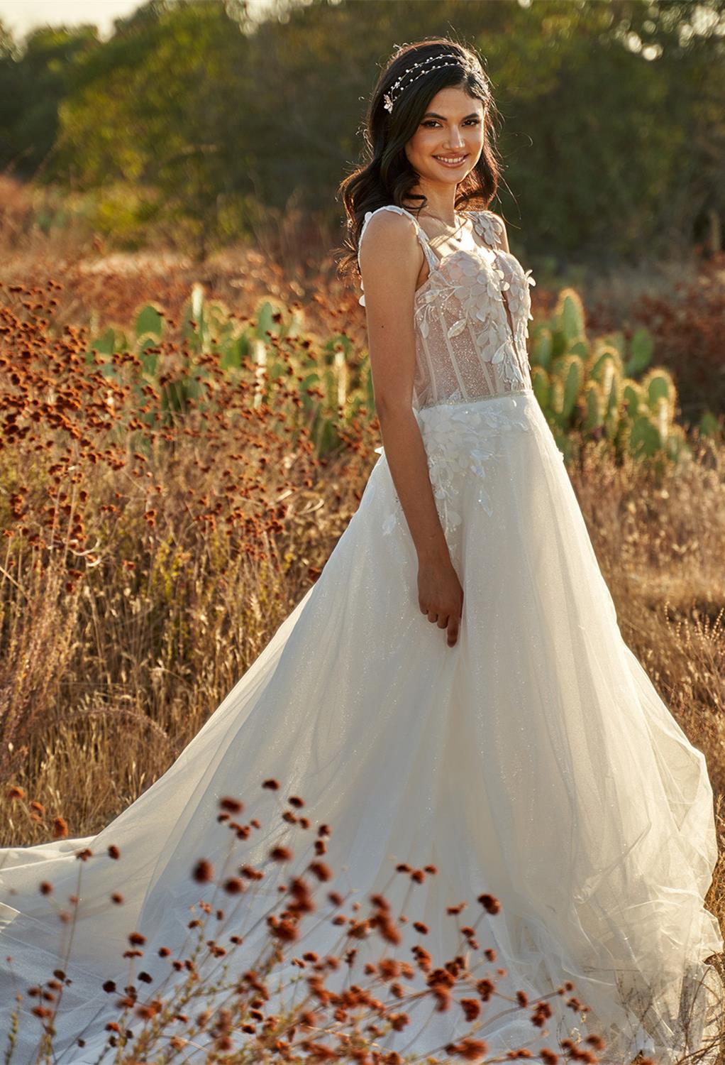 with beautiful layers of tulle make the Deanna dress a must-have for the bride looking for a classic gown. Select your perfect gown