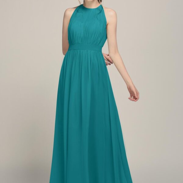 translucent halter bodice offers full coverage and just a peek at the sweetheart neckline beneath. A keyhole back shows