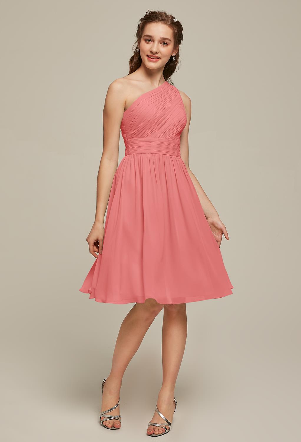 The Elisha dress has a loose pleated skirt that flows beautifully when you walk or dance in it. This bared shoulders knee length dress is offered in a number of elegant color options that you will simply fall in love with. Select your perfect size from th