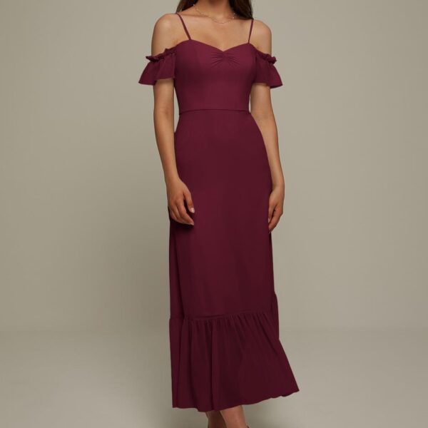 the Elma dress offers a pretty combination of spaghetti straps and butterfly sleeves. There are several beautiful colors to choose from