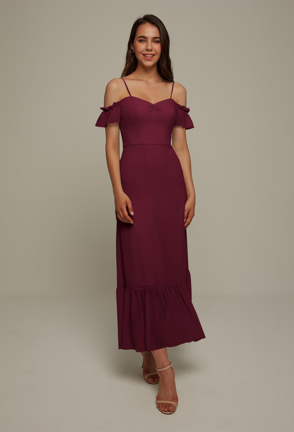 the Elma dress offers a pretty combination of spaghetti straps and butterfly sleeves. There are several beautiful colors to choose from