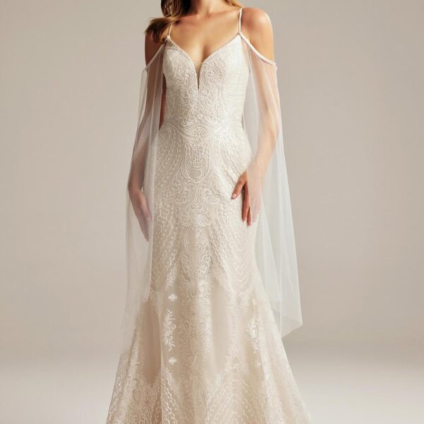 this floor-length gown makes the bride look and feel like a shooting star. With elements of a  sweetheart neckline