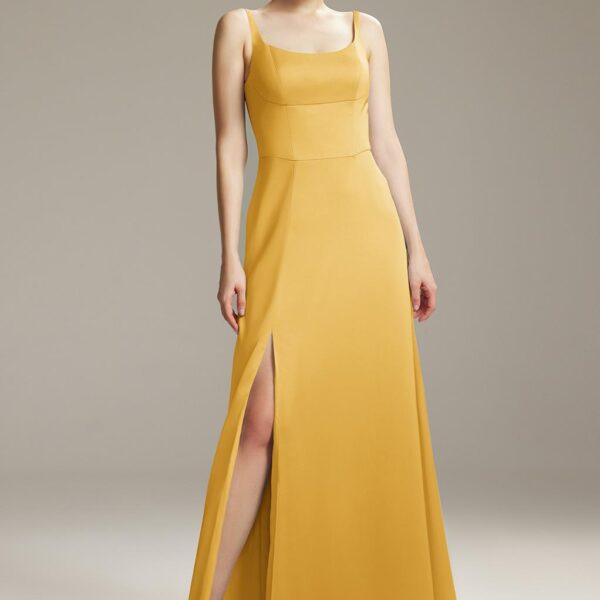 with a floor-length hemline for a graceful look. The scoop/U-neck neckline is adorned with sheer straps