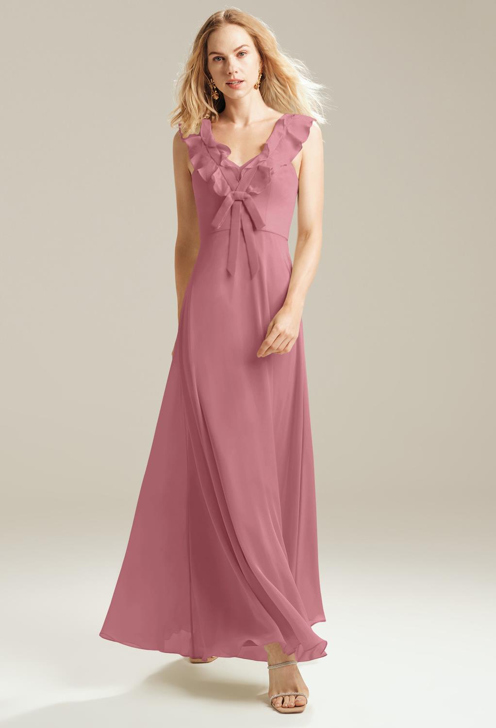 with a V-neck design that is flattering and flirty. The chiffon fabric of the dress will fall gracefully across your curves and will give you the elegant movement that you're looking for when you&#