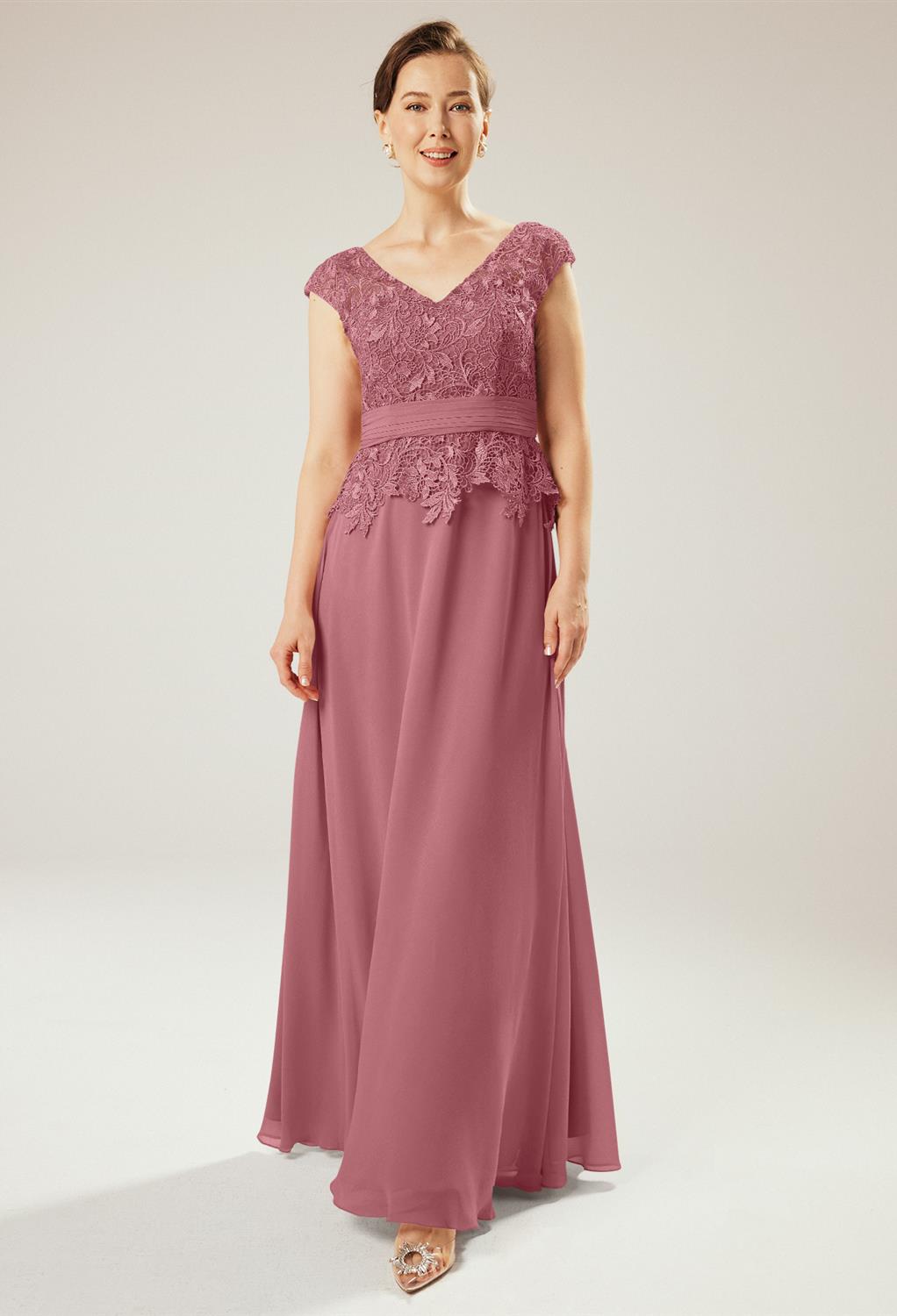 unique blend of lacy and plain materials. It's a simple floor-length  A-line gown with strapless cap sleeves an