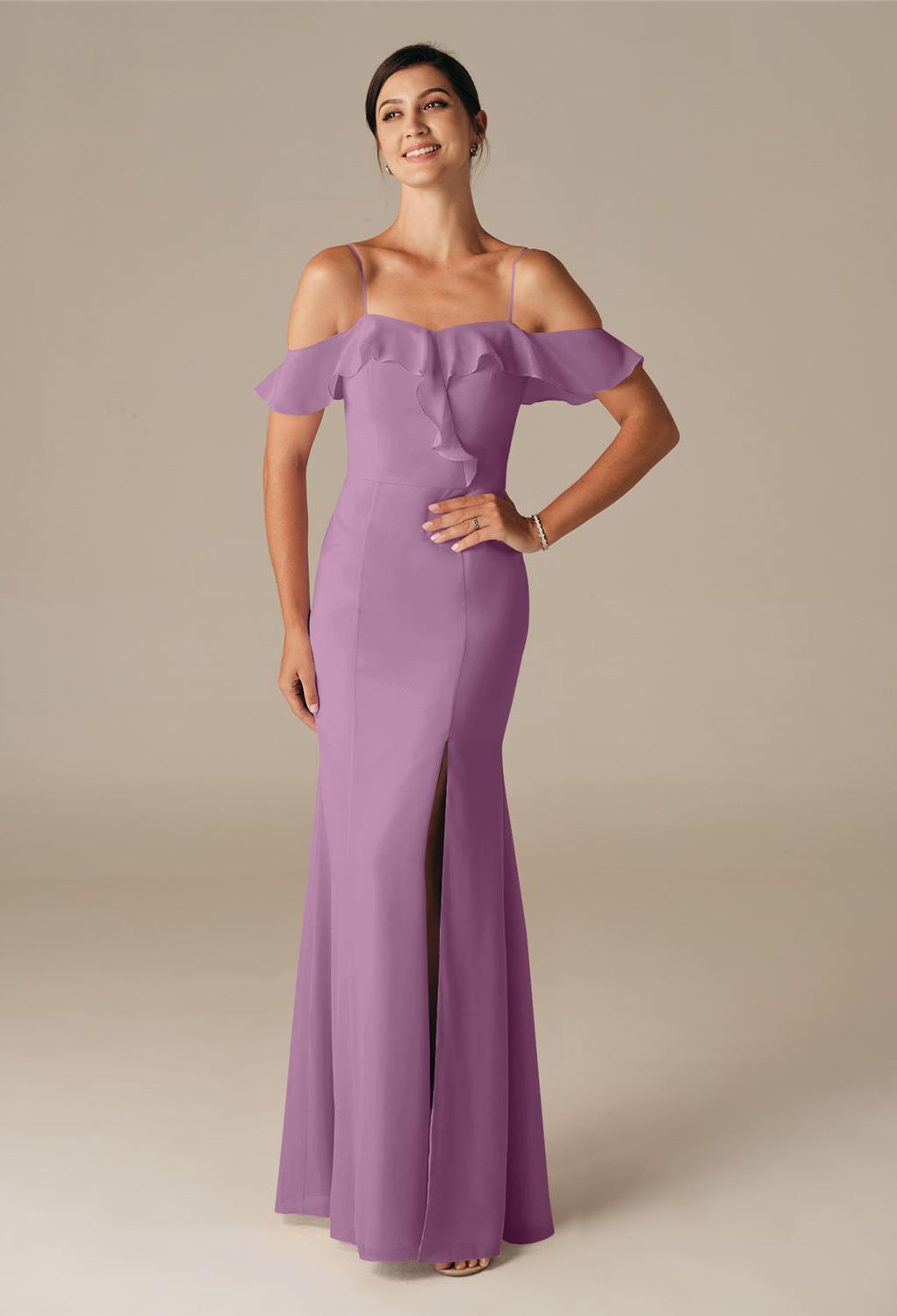 Butterfly sleeves and spaghetti straps come together in a romantic design that bares your shoulders in the most elegant of ways.The Isotach dress offers a snug fit that flares in a subtle way with deep pleats that add depth and gracefulness.This is a char