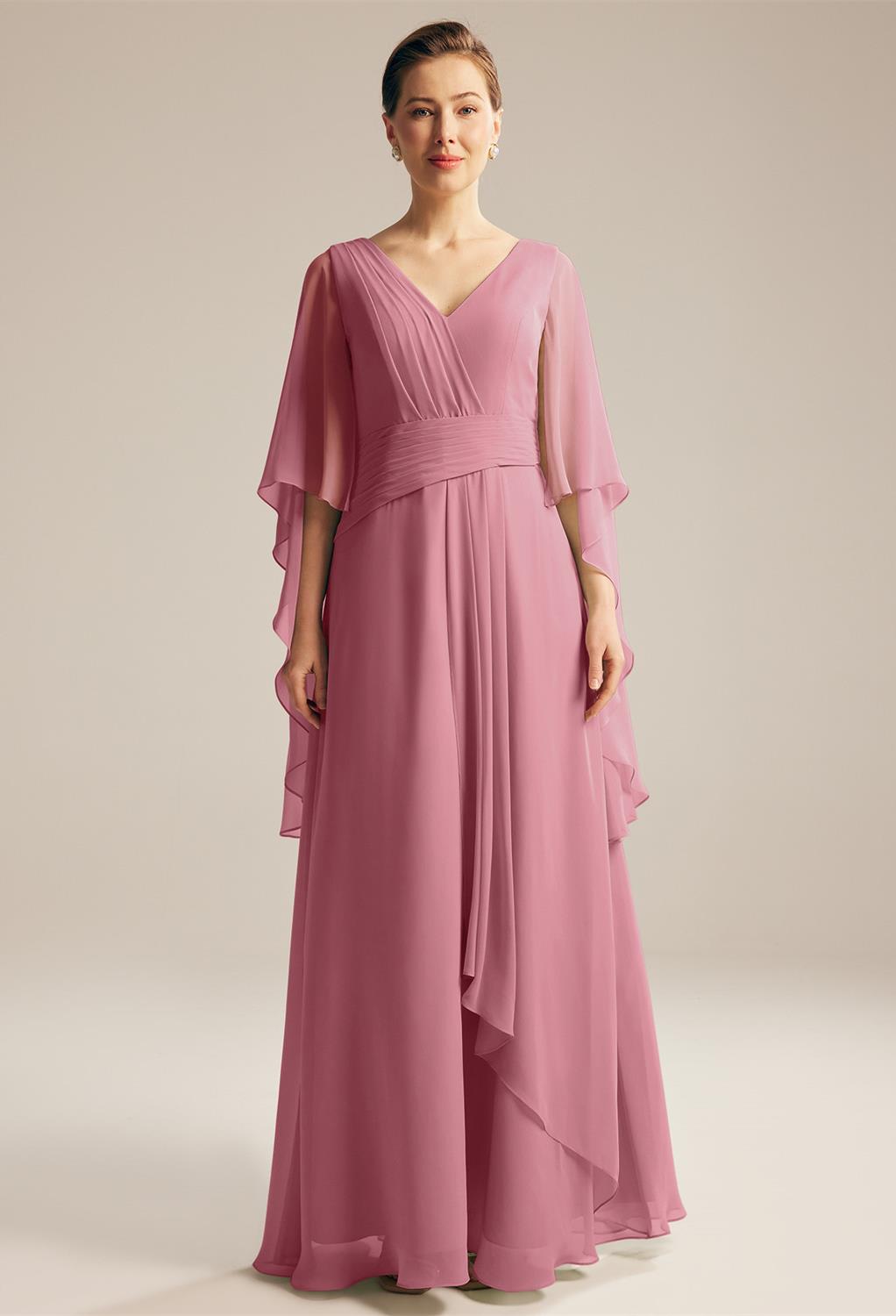 The flowing dress is made of chiffon and butterfly sleeves to make it a complete fashion statement. The ruch embellishment makes the dress looks more appealing. AW Josh dress features butterfly sleeves and is lined with a built-in bra. The V-neckline and