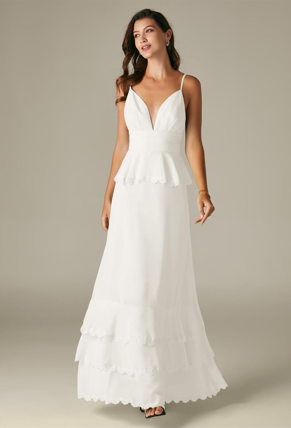 while the spaghetti straps bare shoulders that are sure to be kissed by the sun during an outdoor spring or summertime wedding.The