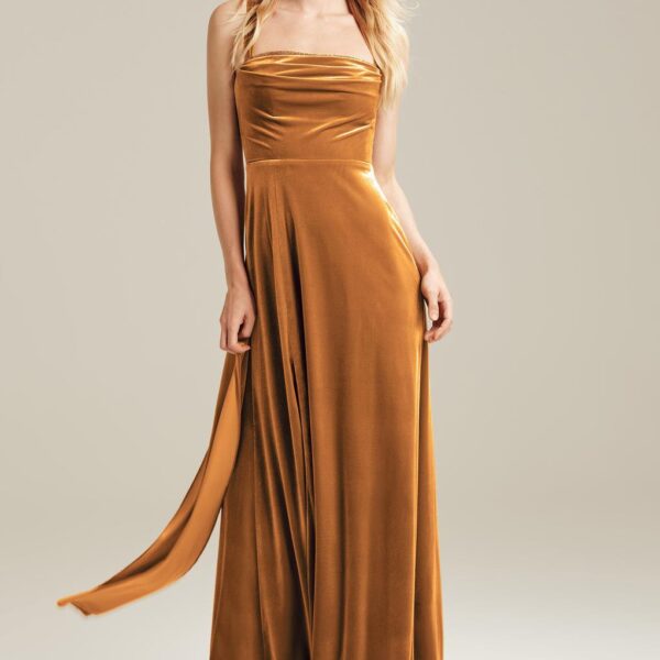 The Lally bridesmaid dress boasts a crisp velvet fabric that will give you the elegant look you want for a bridesmaid. The dress is a floor-length gown perfect for that traditional wedding. The straight neckline is flattering for ladies of all ages and bo