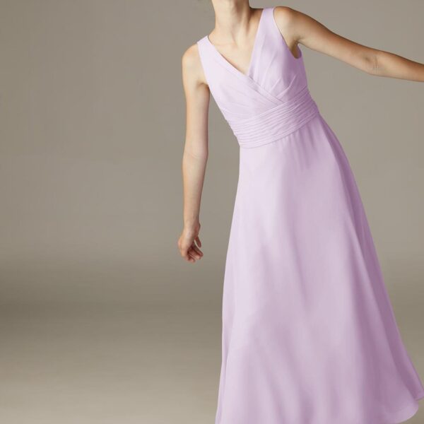 with a flattering V-neck design that's perfect for showing off a lovely gold necklace.Pull her hair
