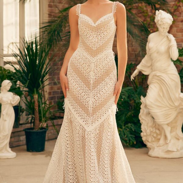 AW Lila embodies a classy chapel train style and a flawless mermaid outline for a bride who admires floor-length lace fabric. The sweetheart neckline blends well with the dazzling sleeveless spaghetti straps fully held in place with a quality zipper. In a