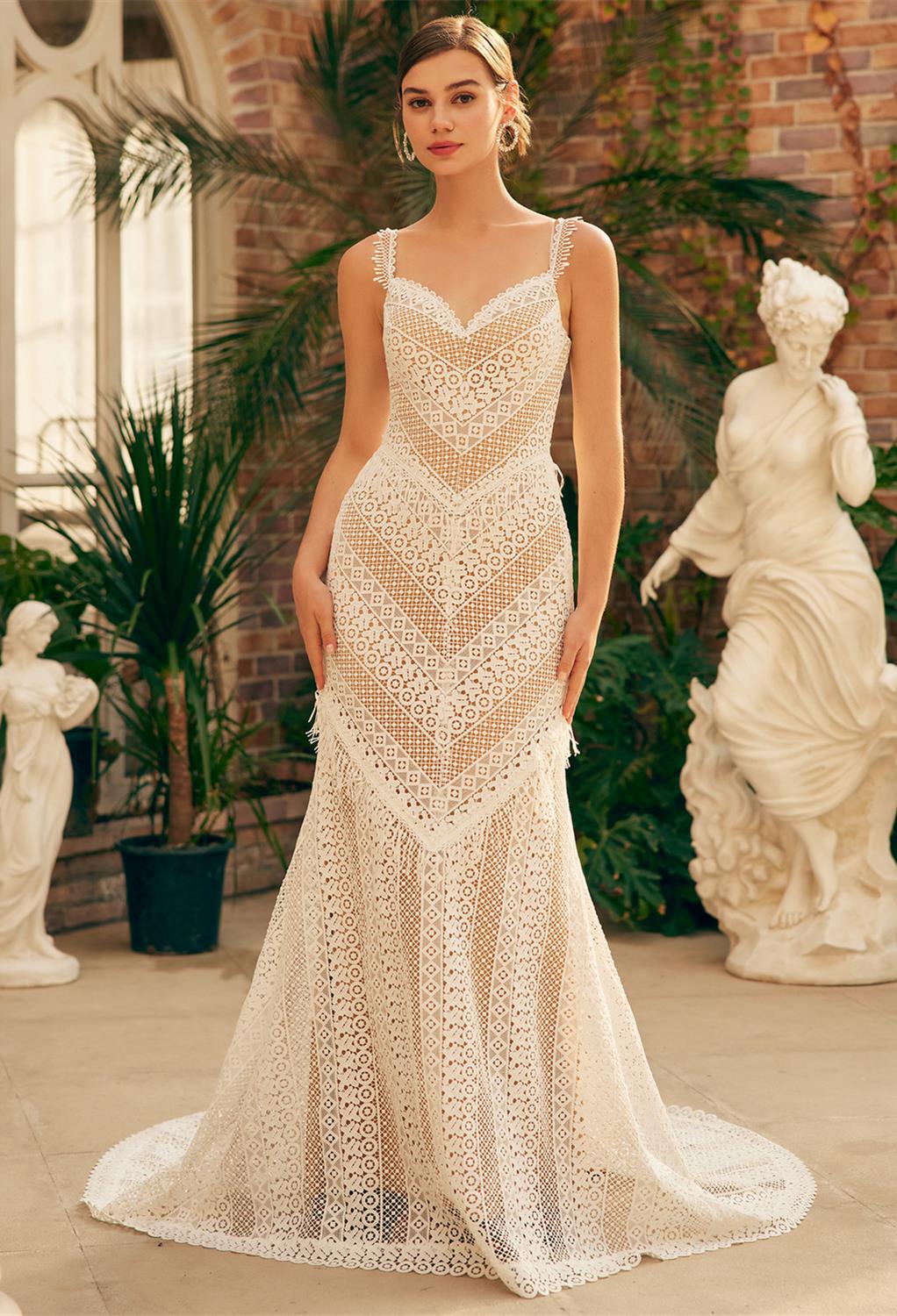 AW Lila embodies a classy chapel train style and a flawless mermaid outline for a bride who admires floor-length lace fabric. The sweetheart neckline blends well with the dazzling sleeveless spaghetti straps fully held in place with a quality zipper. In a