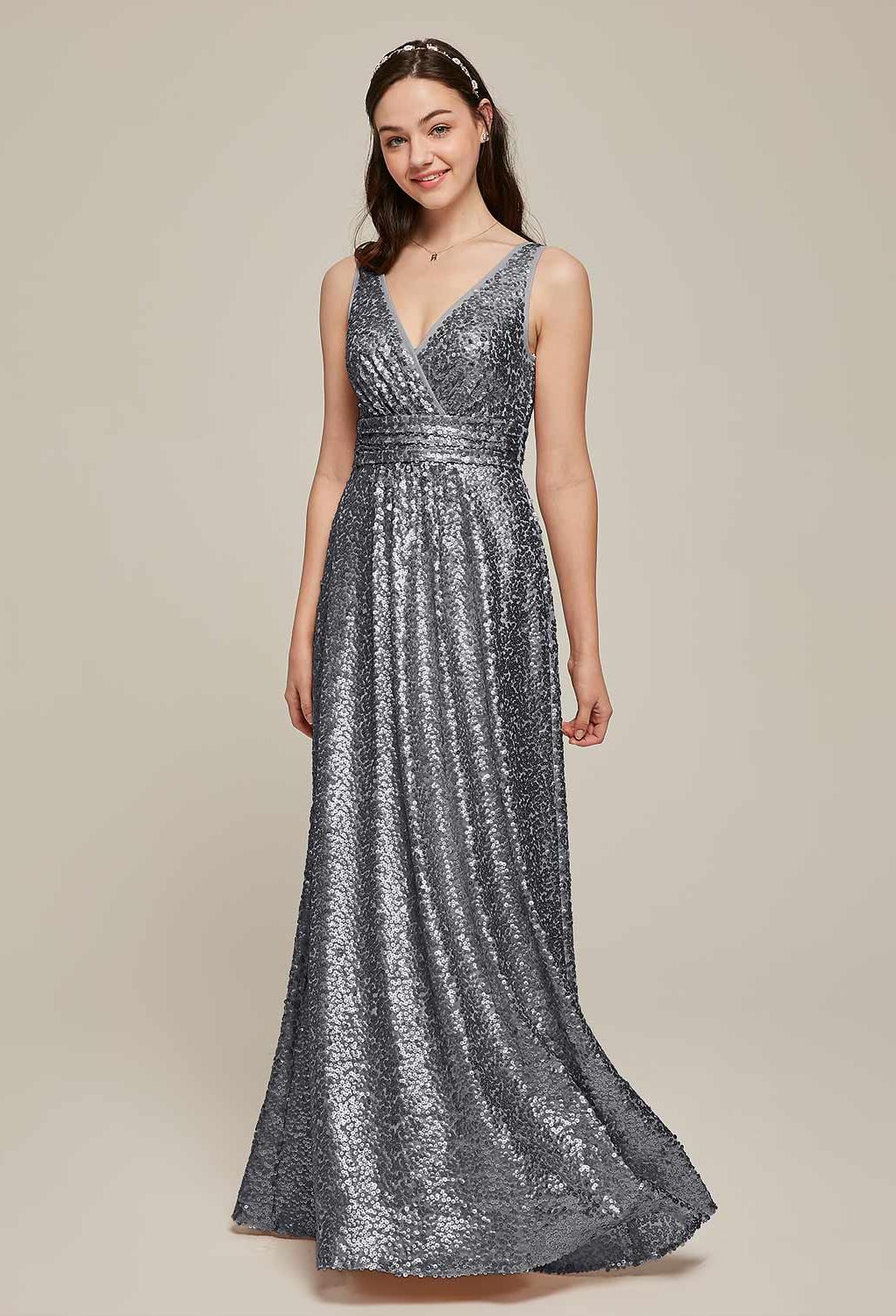 Shimmering elegance adds a romantic charm to the Louise dress. The plunging neckline and flattering cut of the dress makes it a great choice for the lady with curves to spare. Select your favorite color option and you are sure to be the radiant beauty who