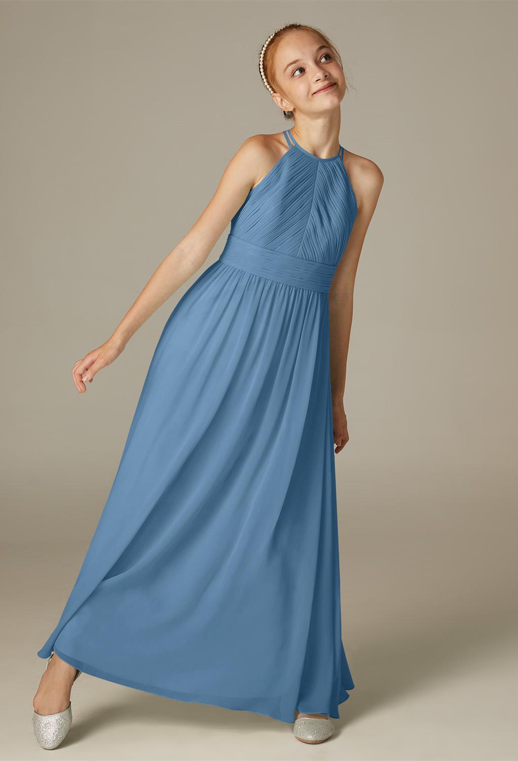 while the skirt flares out with pretty pleats.The layered chiffon look will prove flattering and si