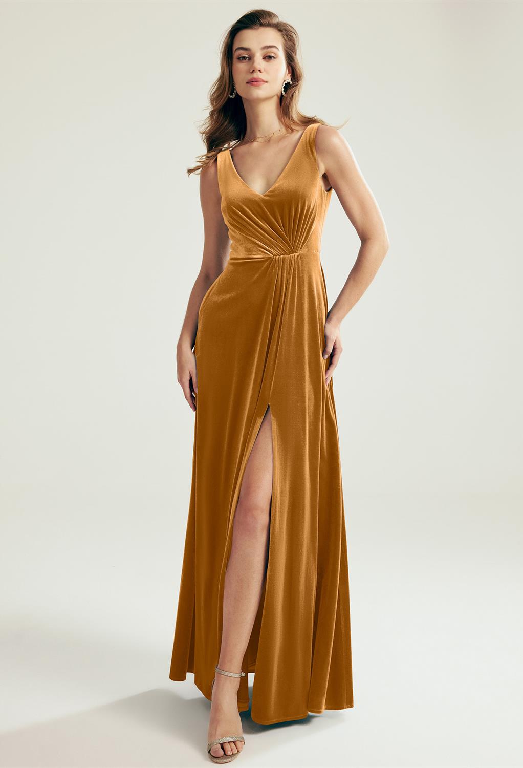 top-quality velvet dress explicitly designed for a romantic winter wedding. It is a show-stopper statement piece for its enchanting aura