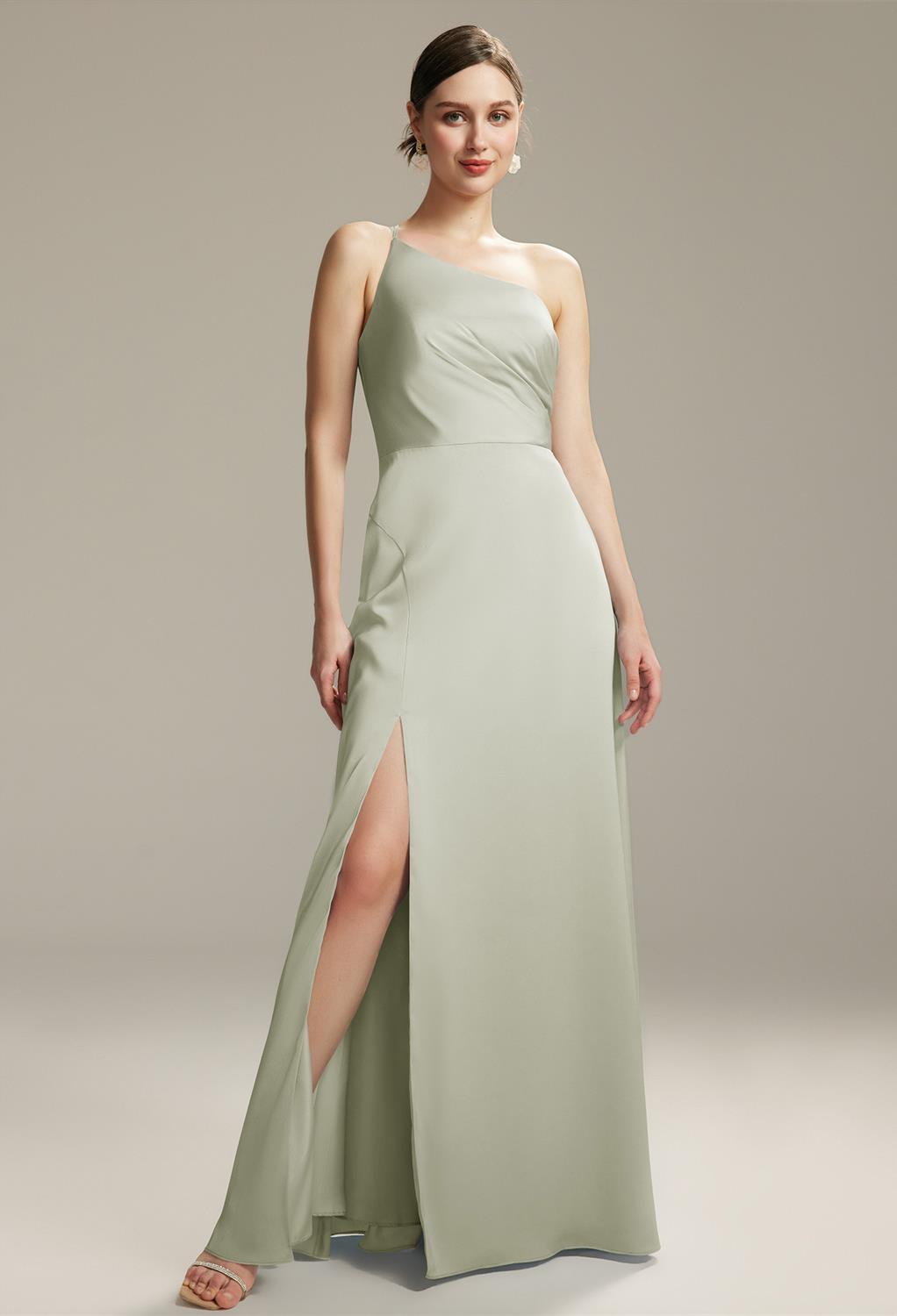 this stunning AW Marjory bridesmaid dress boasts an elegant A-line silhouette and floor-length hemline. The asymmetrical neckline and one-shoulder design add a touch of uniqueness