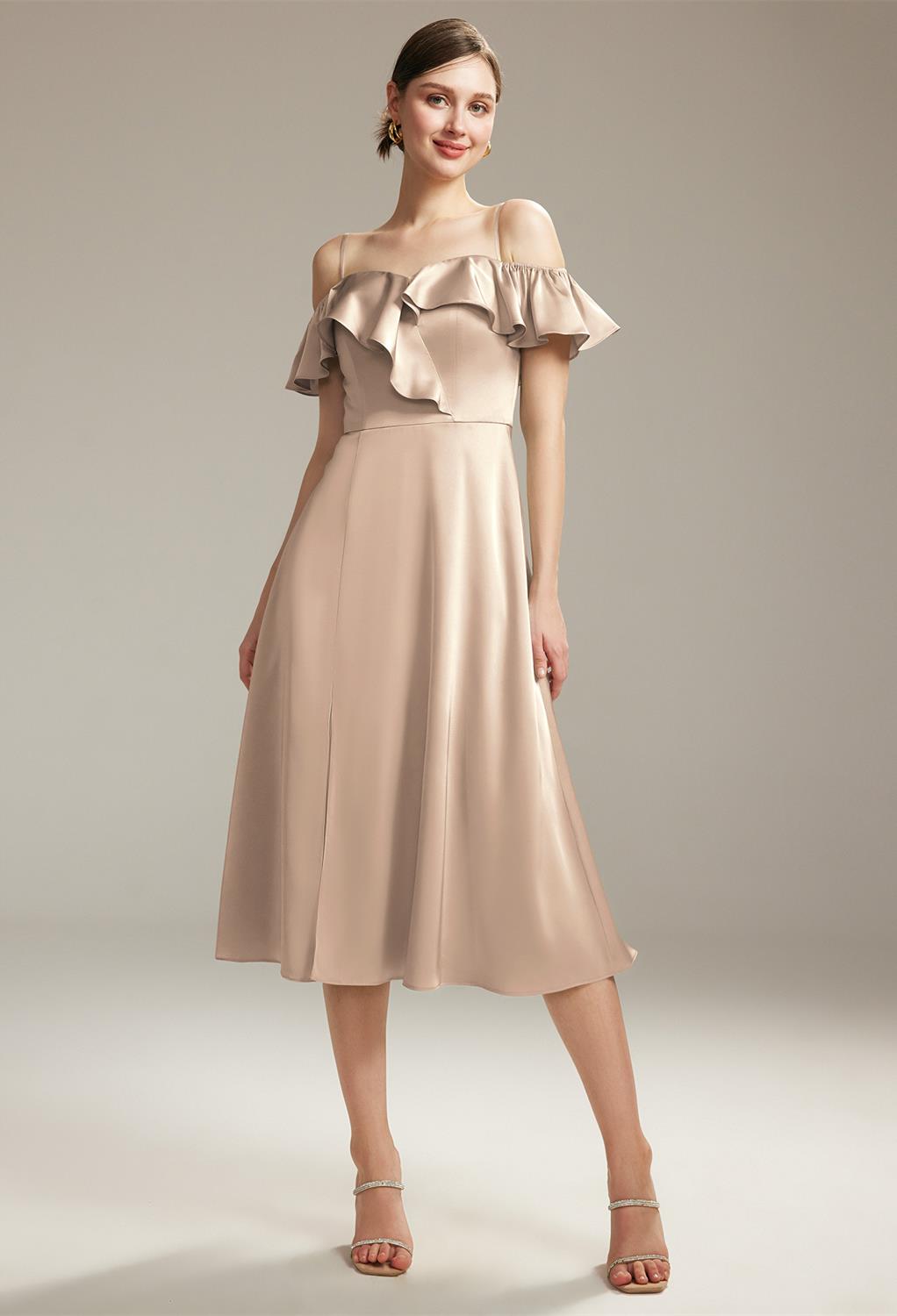 this dress flaunts a graceful tea-length silhouette design