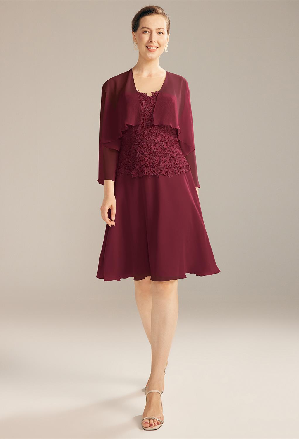 knee-length dress from luxurious lace. The jacket features ? sleeves and it's detachable