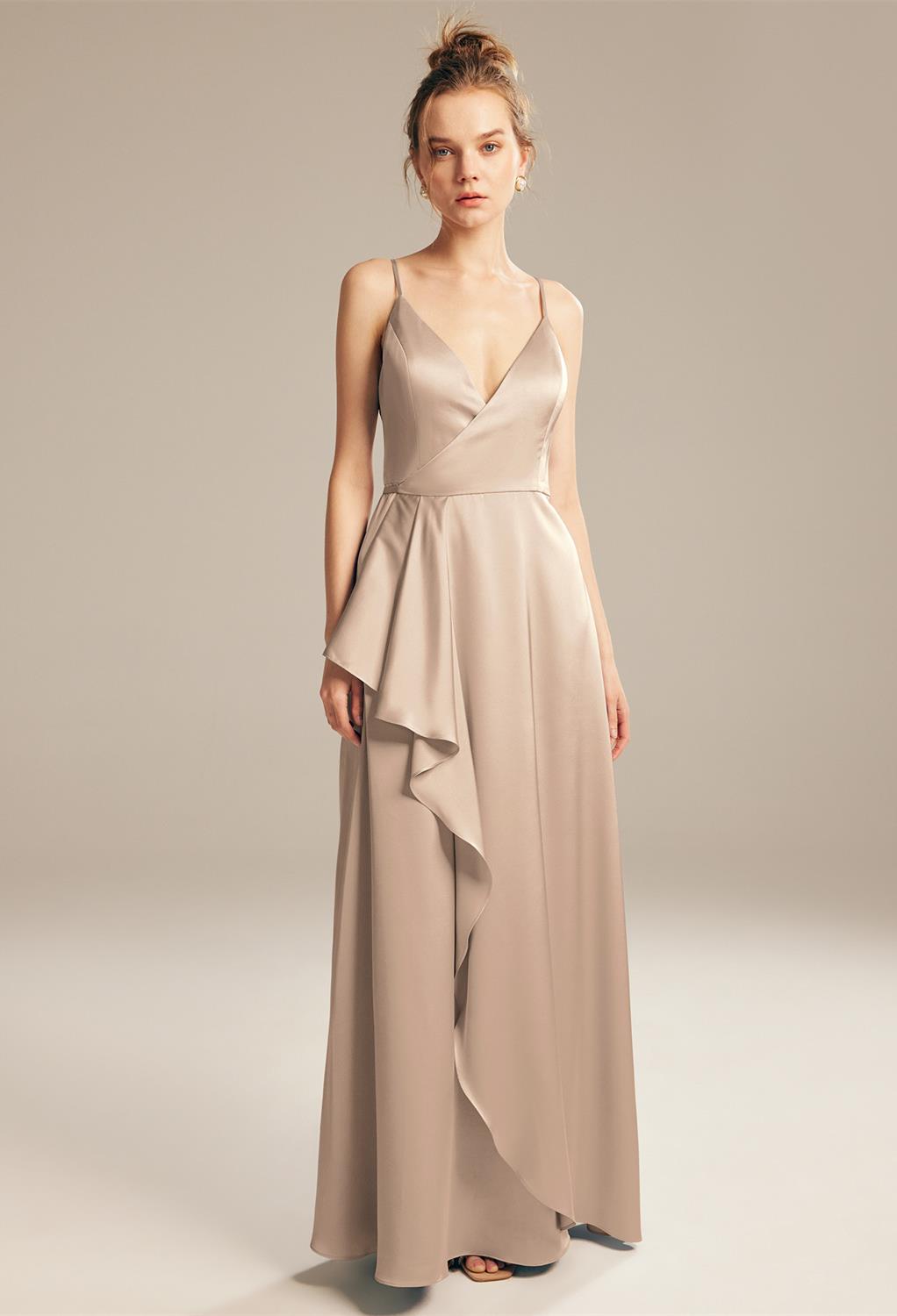 the bride is full of immense self-confidence yet gentle at heart and wants her squad to embody those messages on her big day. This V-neck