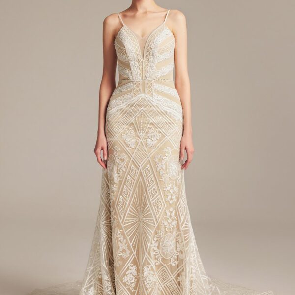 sleeveless dress with a mermaid outline flowing in a chapel train. It has a