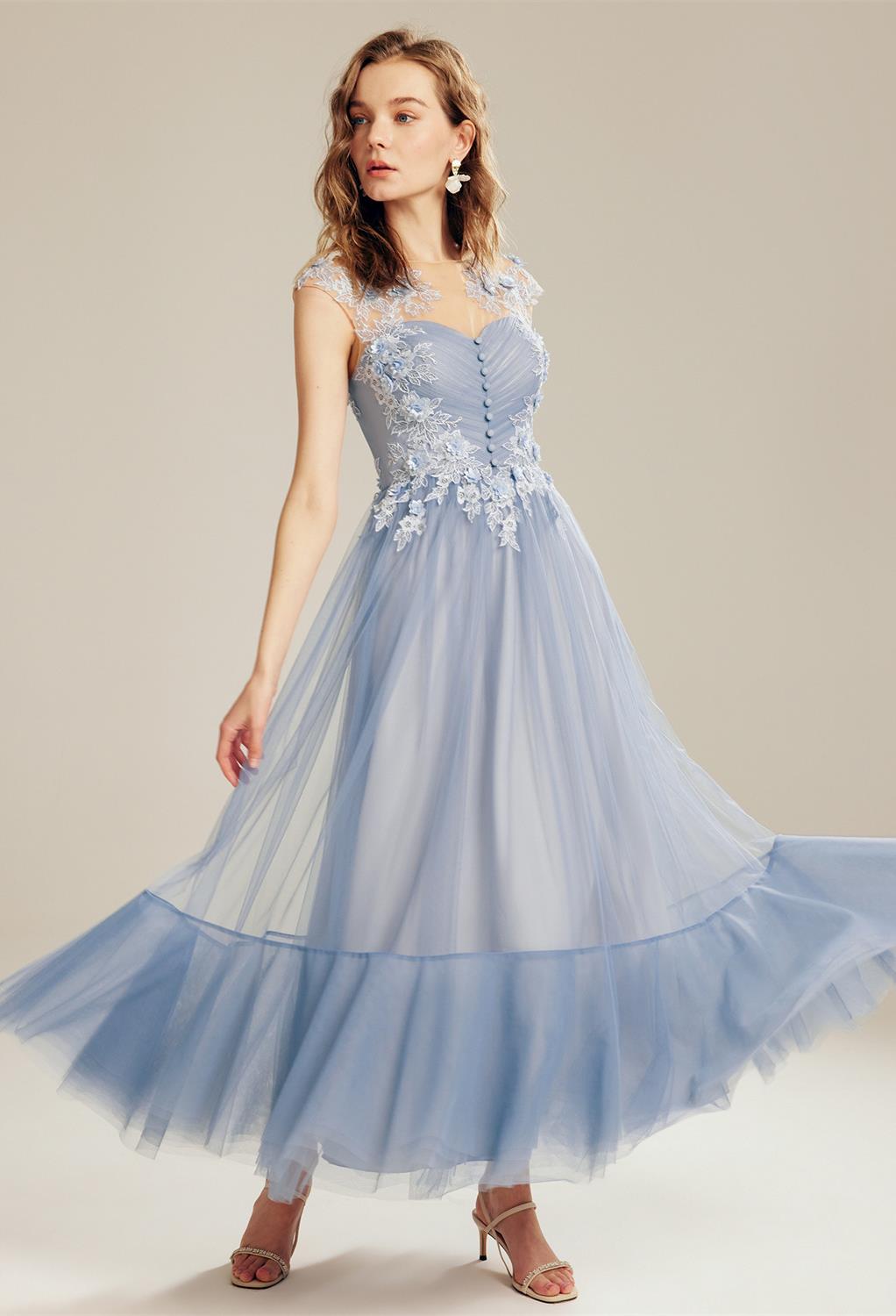 featuring a classic jewel neckline and an elegant ankle-length cut for a touch of fairytale grace.