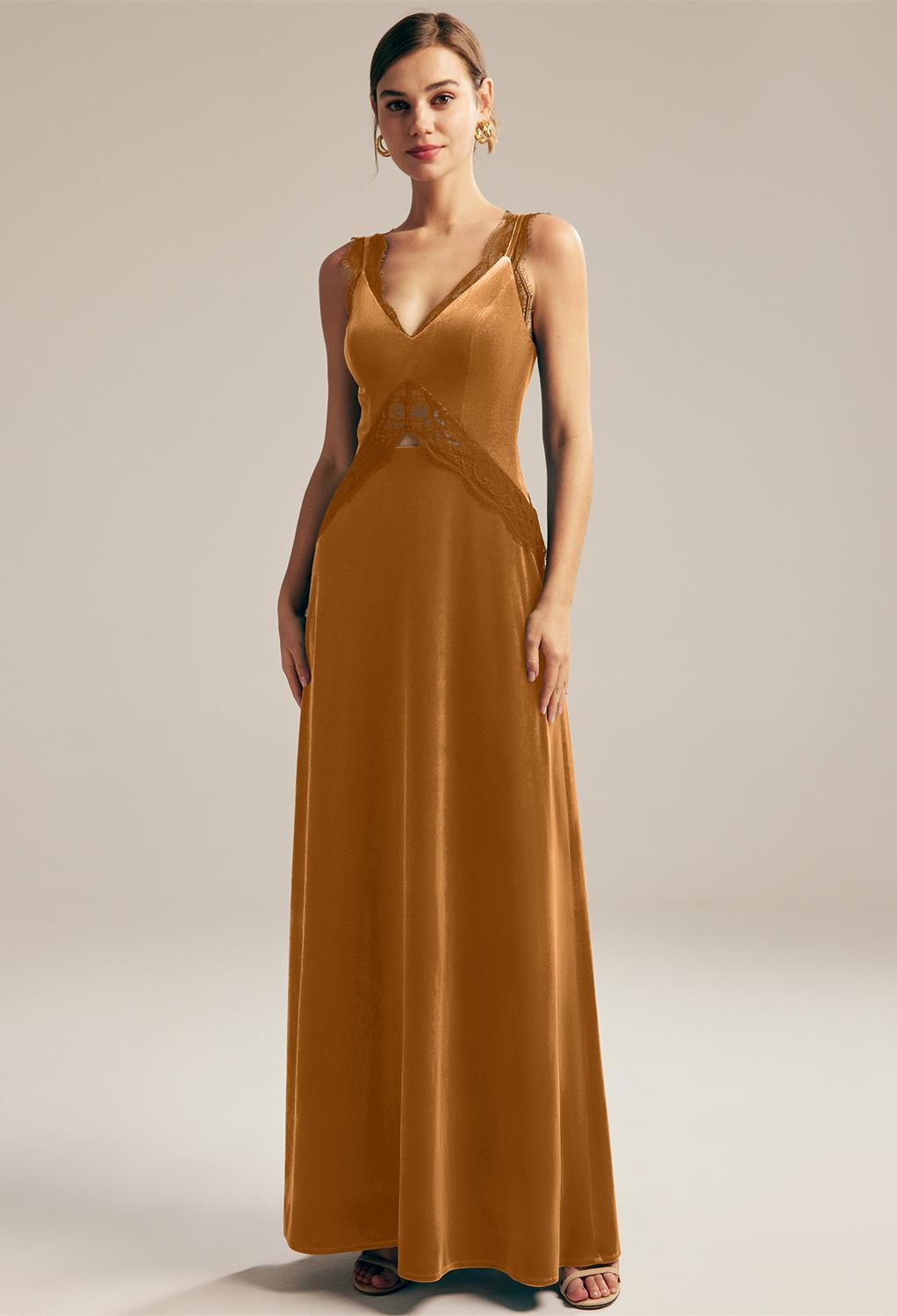 floor-length dress is the best pick for a bride who wants a most appealing vintage or classic regal bridal look. It features a V-necklin