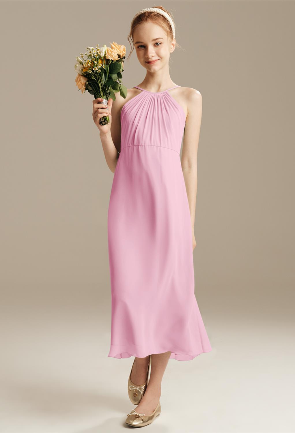 the Poppy dress has a hi low skirt length that is simply charming. The cross straps are an elegant choice