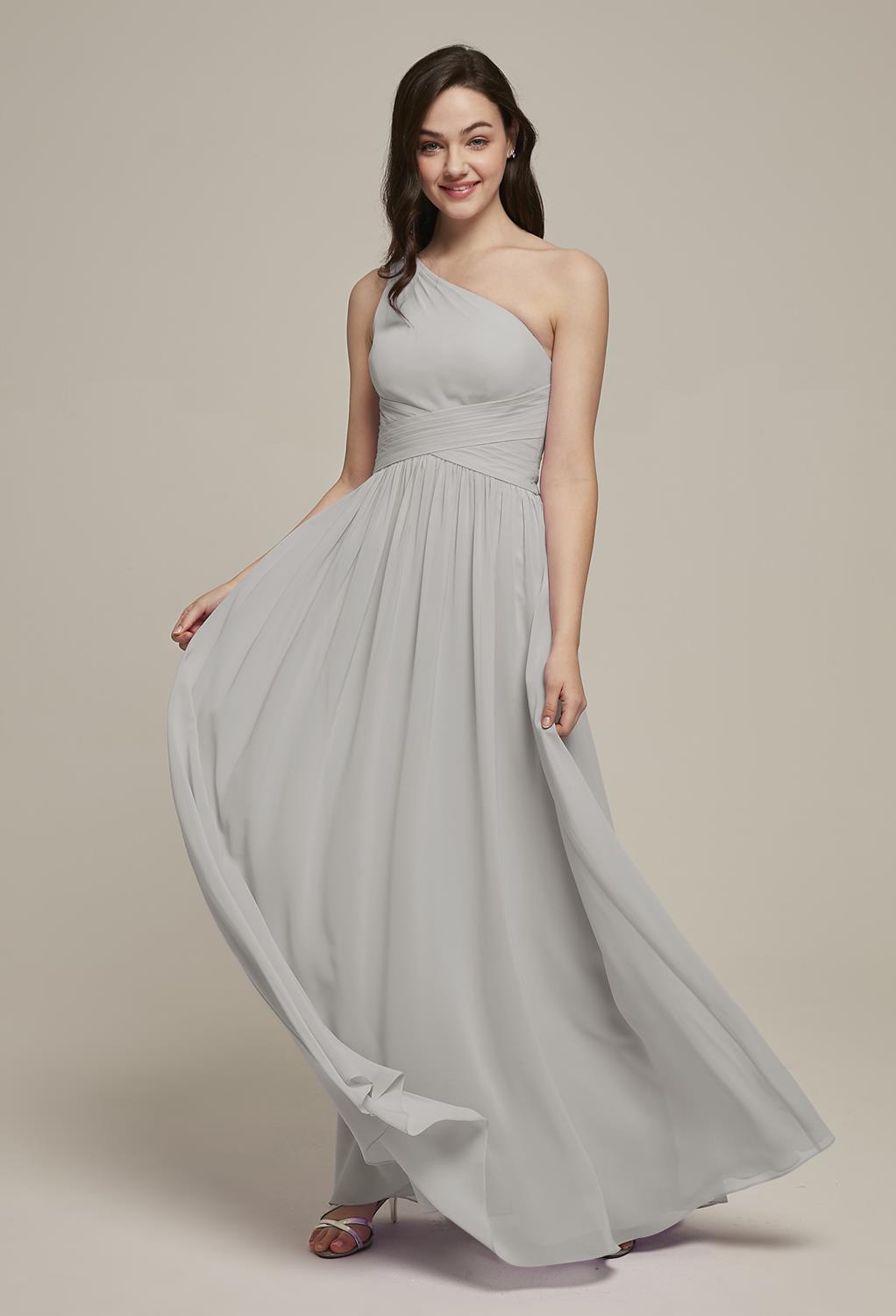 for today's contemporary lady. The fitted bodice is flattering