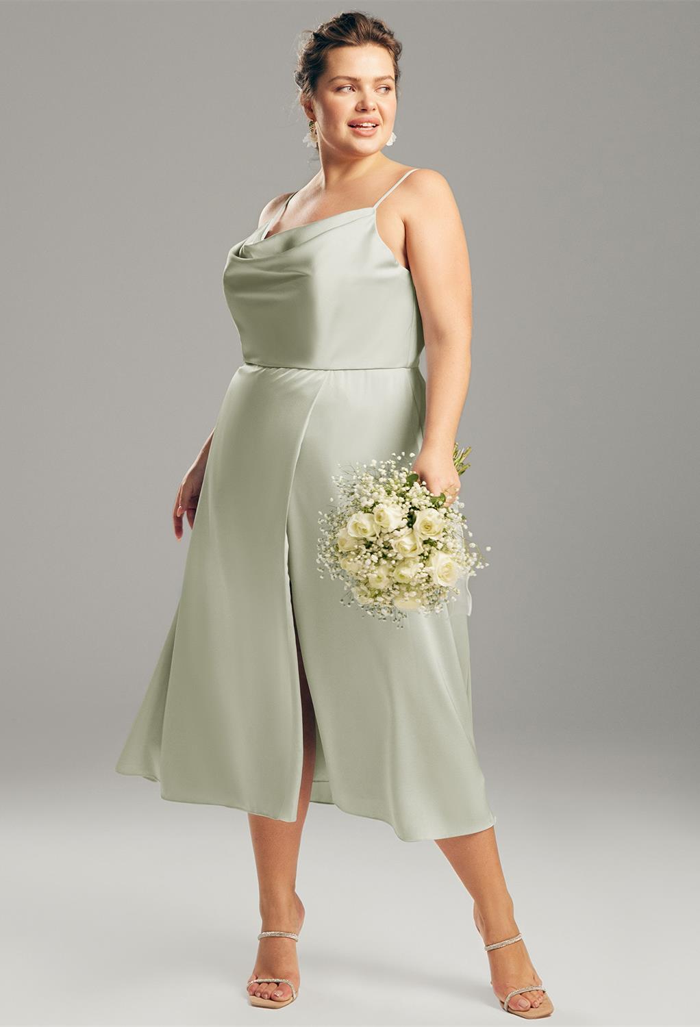 The AW Renee Dress is a classic and simple masterpiece. It is made from high-quality satin charmeuse whose sleekness shines in each available color and would pull off a diverse color bridesmaid uniform nicely. It is a beautiful and modern A-line bridesmai