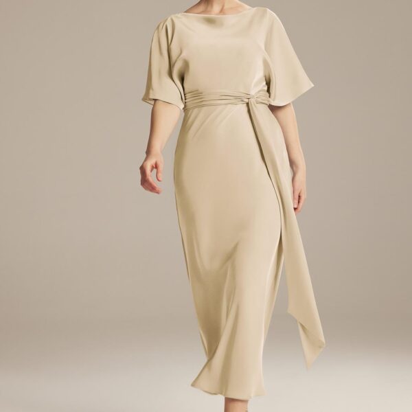 The AW Romula Dress is a glamorous-looking satin dress that embodies a clear touch of modern column silhouette vibes. This ankle-length dress is suitable for mothers of the brides and draws out a picture-perfect luxury while its elbow sleeves keep it simp