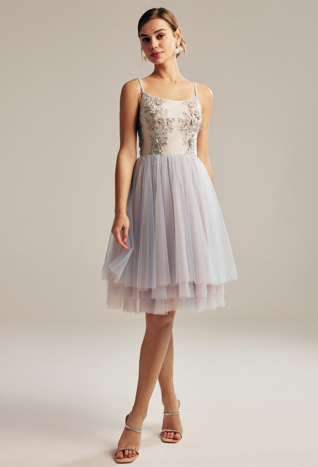 where the classic A-line meets knee-length finesse