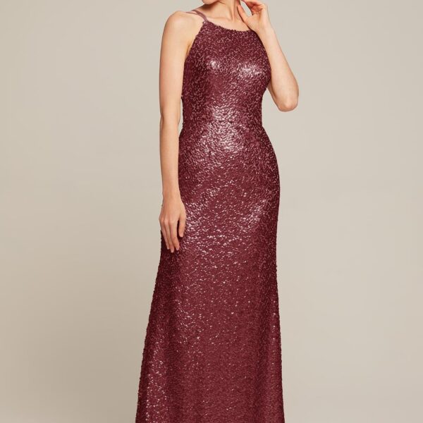 while the floor length of the gown adds a romantic feel. Pair the dress with your favorite heels and you'll be ready to dance the night away. The Rosita is offe