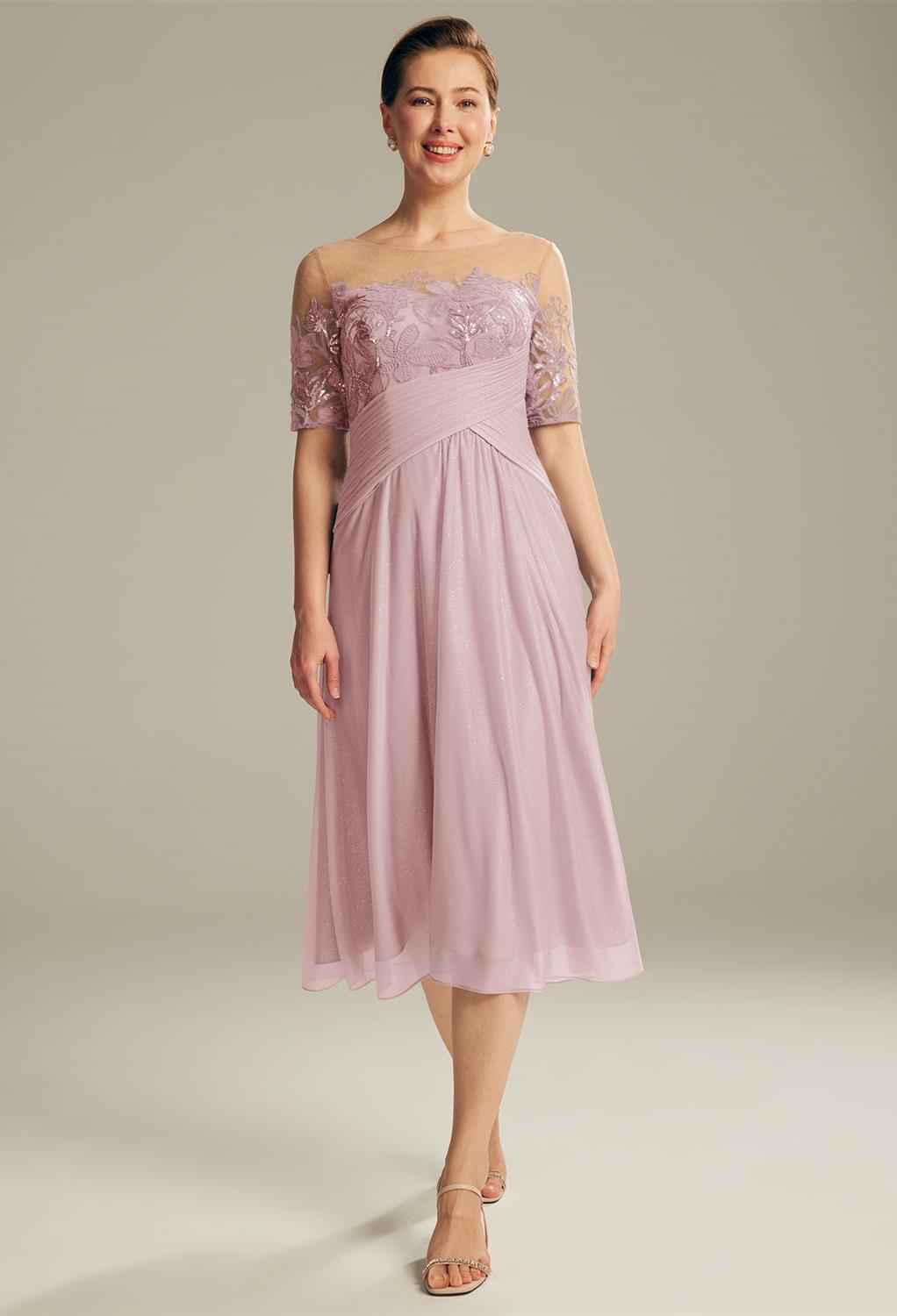 The Aw Sabella tea-length dress is a beautiful choice for the get to gather party. The dress is made of high-quality glitter mesh with a bateau neckline that gives the dress a defined outlook. The A-line body figure with the back zipper makes the dress ea